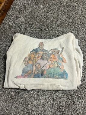 Cream Pullover Hoodie with Multi-Artist Graphic